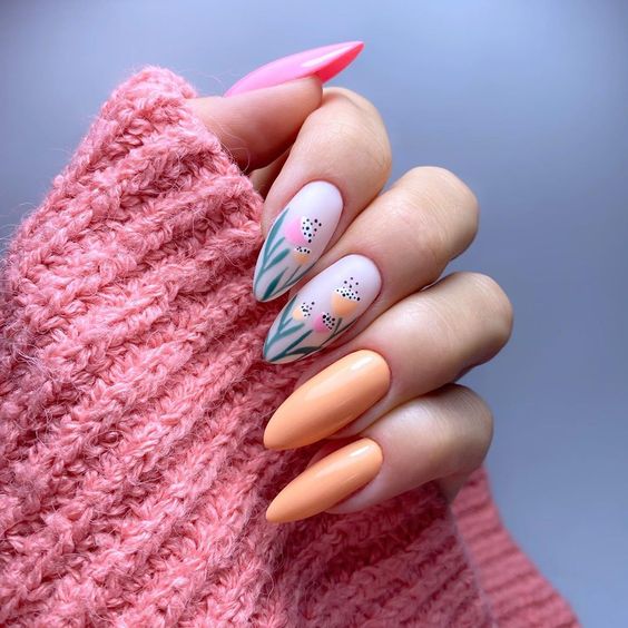 almond shaped nail with flower design