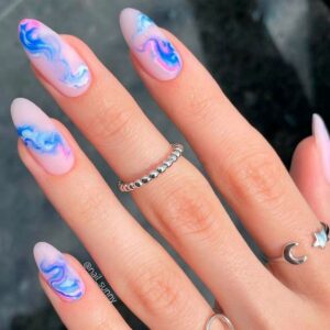 blue pink water marble nail design