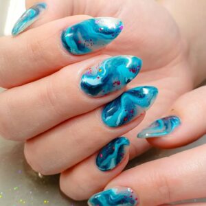 turquoise water marble nail design