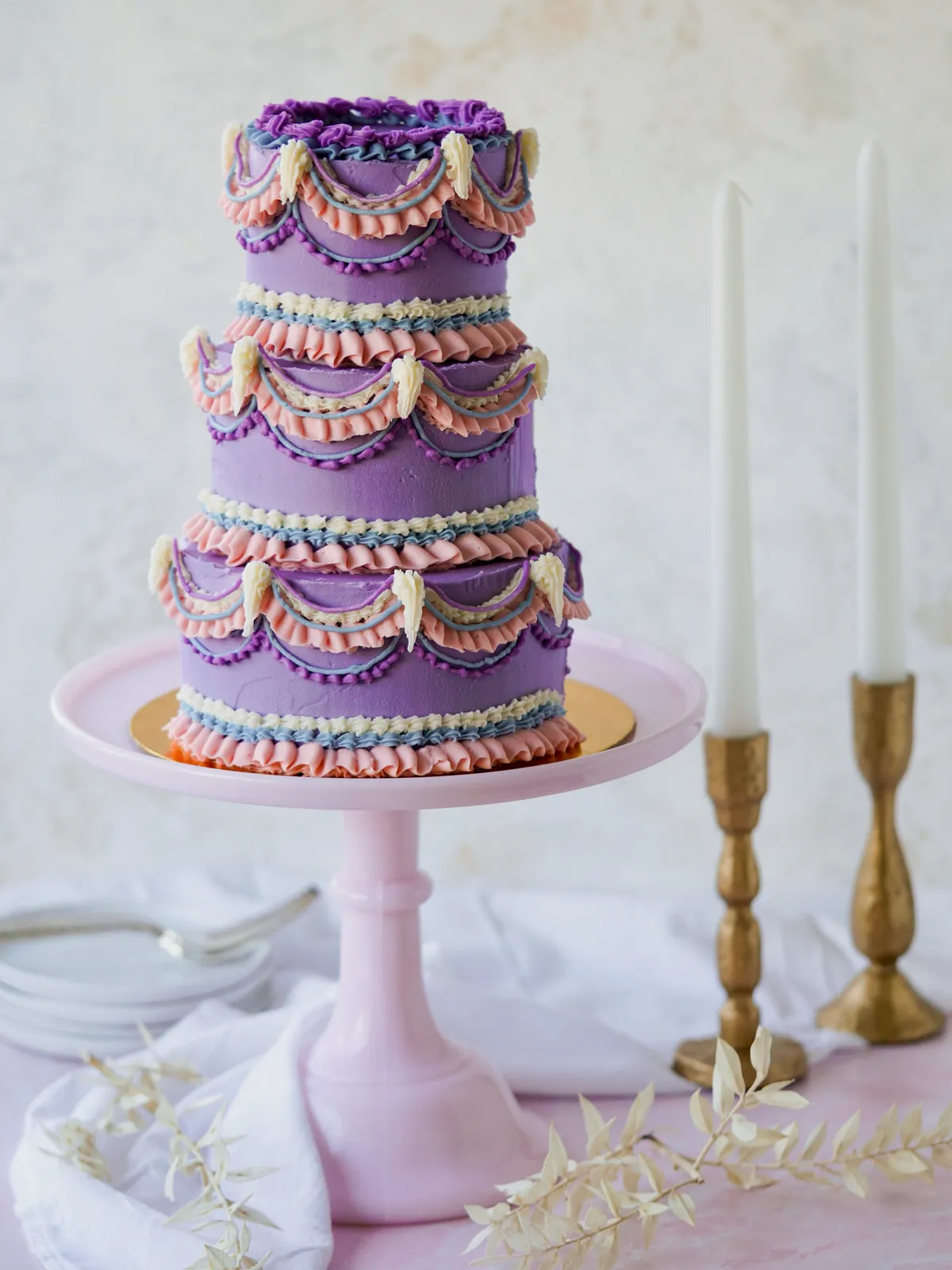 Photo shared by Sarina | Food Photography on August 25, 2026 tagging @williamssonoma, @wiltoncakes, @kerrygoldusa, and @heilalavanilla. May be an image of wedding cake and text.